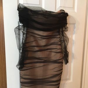 Two dresses (sold separately).